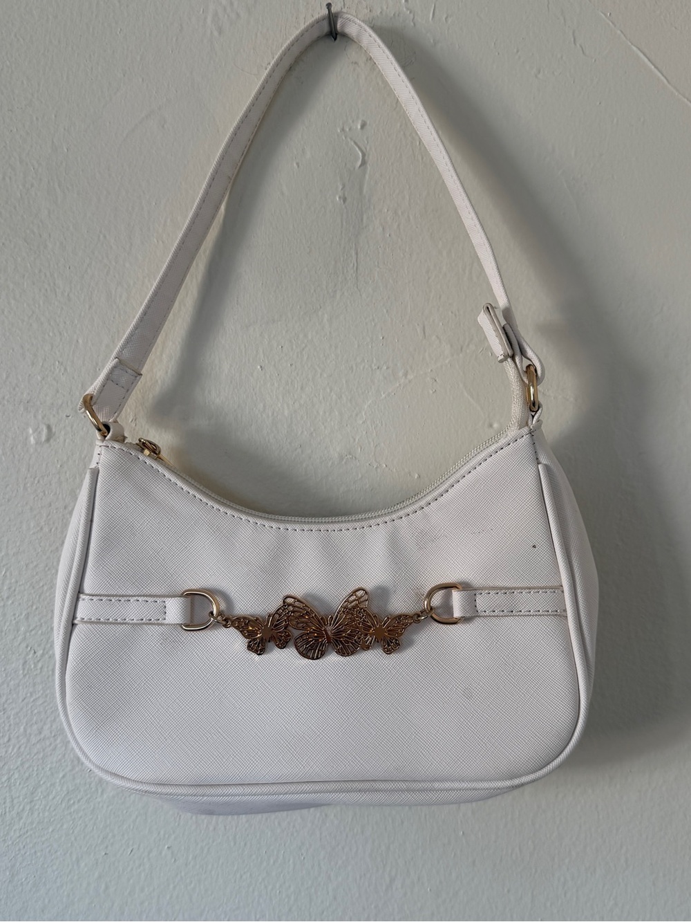 White Shoulder Bag with Gold Butterfly Accent